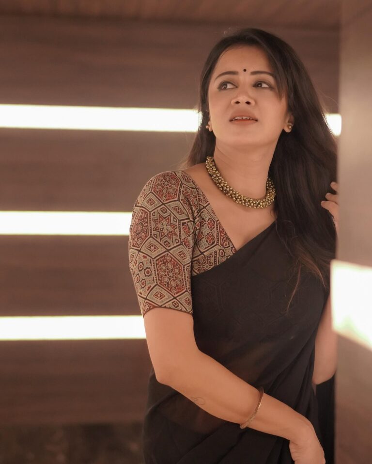 VJ Anjana Rangan Cute Photos In Black Semi Transparent Saree ...